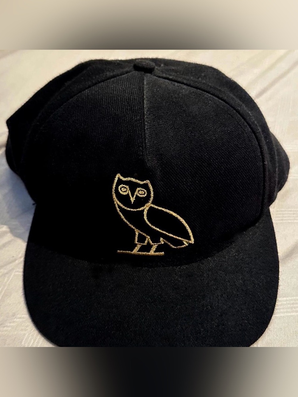 Black OVO cap with gold logo